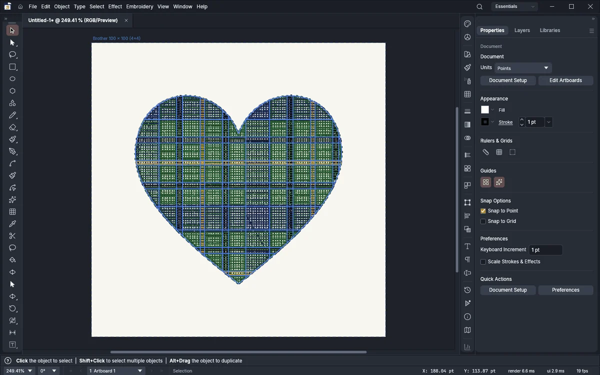 A tartan heart sample with woven-looking green, blue and gold stitches